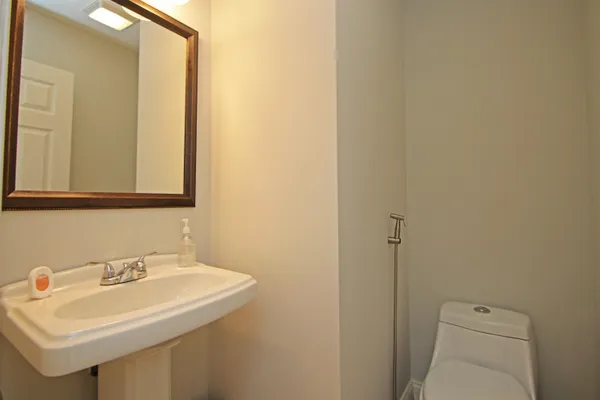a bathroom with a sink and a toilet