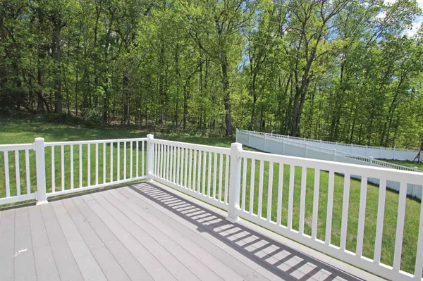 a view of a wooden roof deck