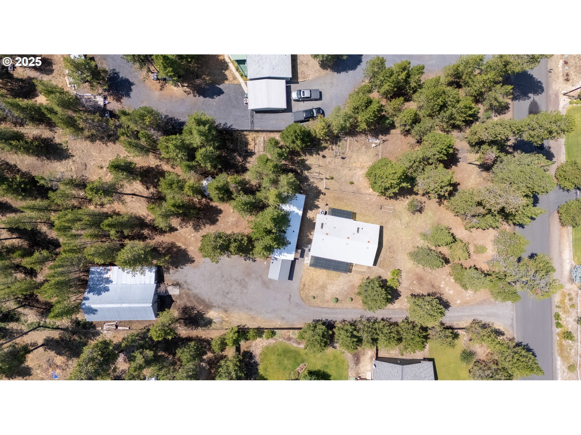 16173 North Drive La Pine, OR 97739 - Photo 17 of 23 an aerial view of a house with a yard