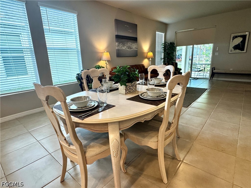 882 Friendship Circle LaBelle, FL 33935 - Photo 16 of 37 a view of a dining room with furniture