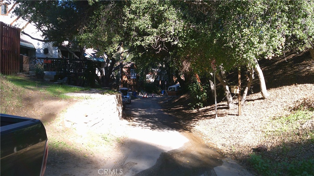 4214 Elzevir Road Woodland Hills, CA 91364 - Photo 3 of 14 a view of a yard covered in snow