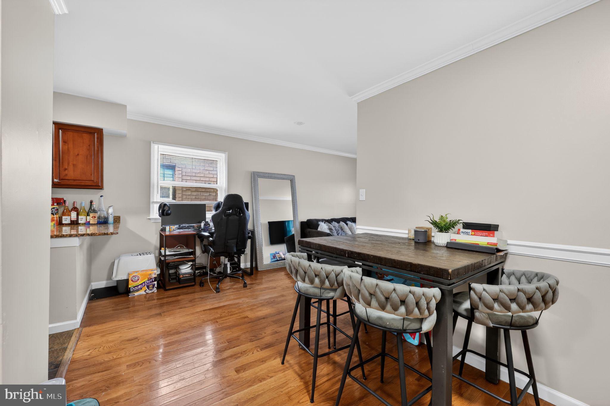 2406 Township Line Road Havertown, PA 19083 - Photo 4 of 15 a view of a dining room with furniture and a livingroom