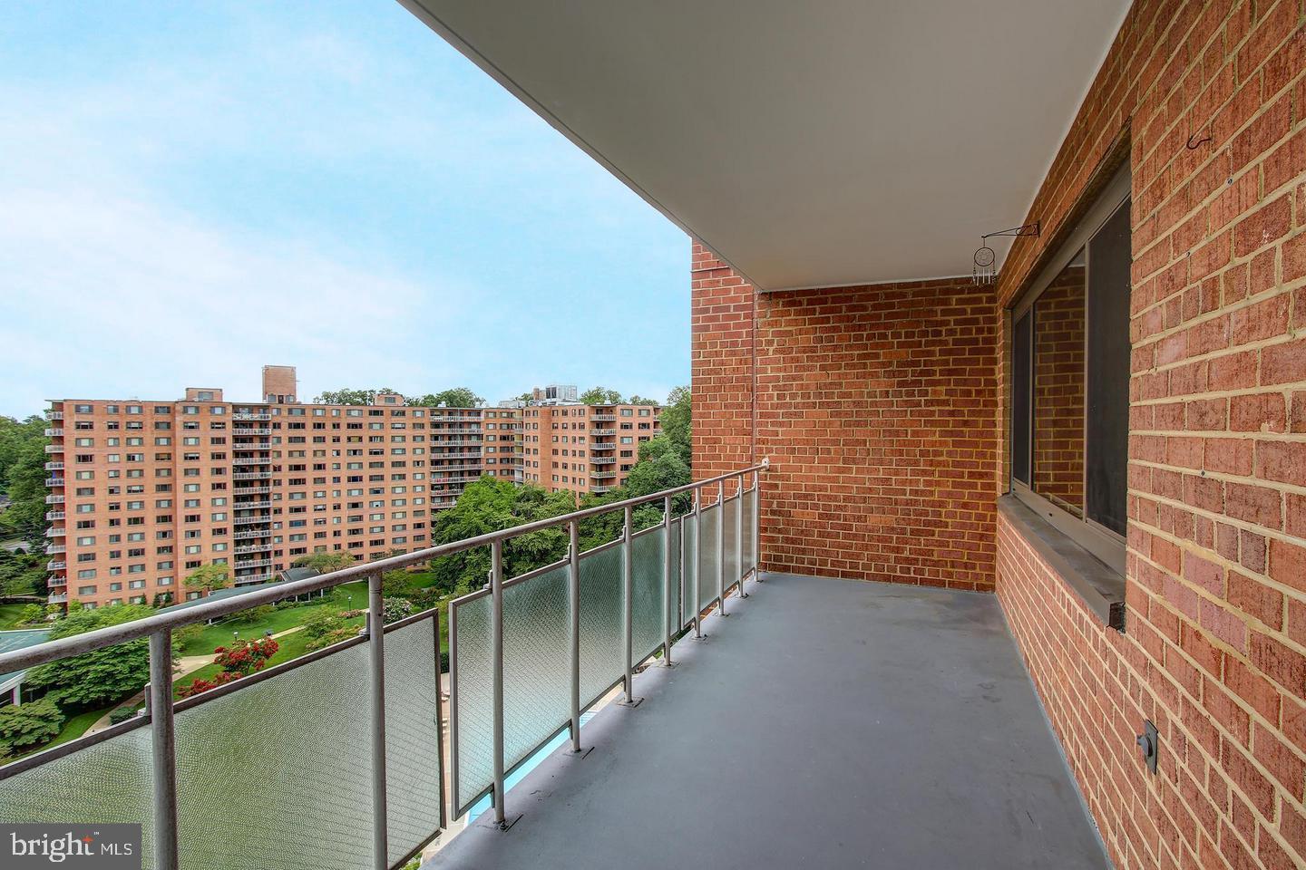 4201 Cathedral Avenue Northwest, Unit 1223E Washington, DC 20016 - Photo 18 of 26 a balcony with city view