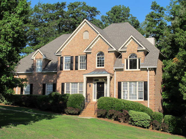 121 Lake Pointe Drive Macon, GA 31210 - Photo 1 of 14 a front view of a house with a yard