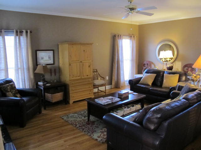 121 Lake Pointe Drive Macon, GA 31210 - Photo 2 of 14 a living room with furniture and wooden floor