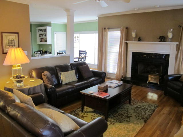 121 Lake Pointe Drive Macon, GA 31210 - Photo 3 of 14 a living room with furniture and a fireplace