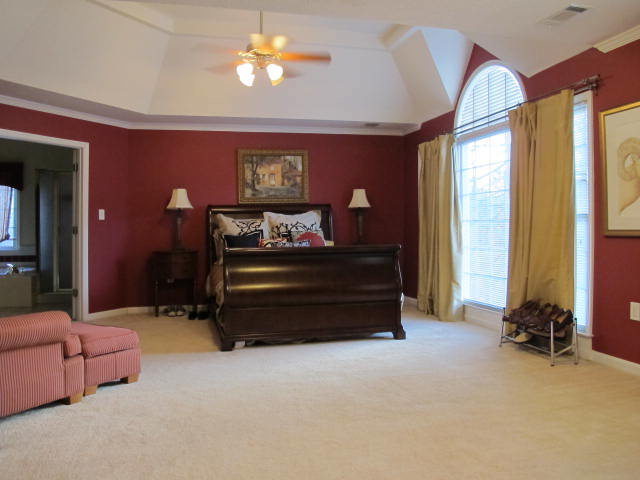 121 Lake Pointe Drive Macon, GA 31210 - Photo 6 of 14 a bedroom with furniture and a large window