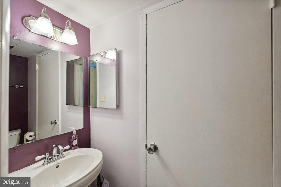 1791 Ivy Oak Square Reston, VA 20190 - Photo 6 of 36 Half bath by front door