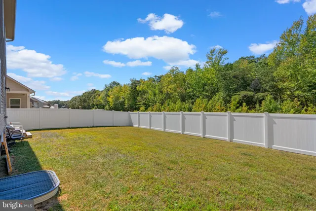 a front view of house with yard