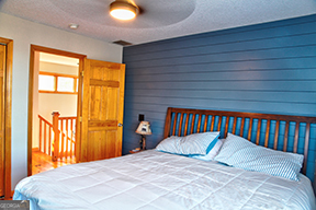 1322 Hunter Drive Ranger, GA 30734 - Photo 15 of 38 a bedroom with a bed and a window