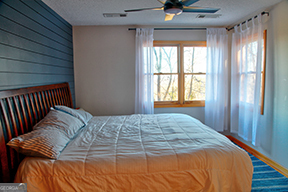 1322 Hunter Drive Ranger, GA 30734 - Photo 16 of 38 a bed sitting in a bedroom next to a window