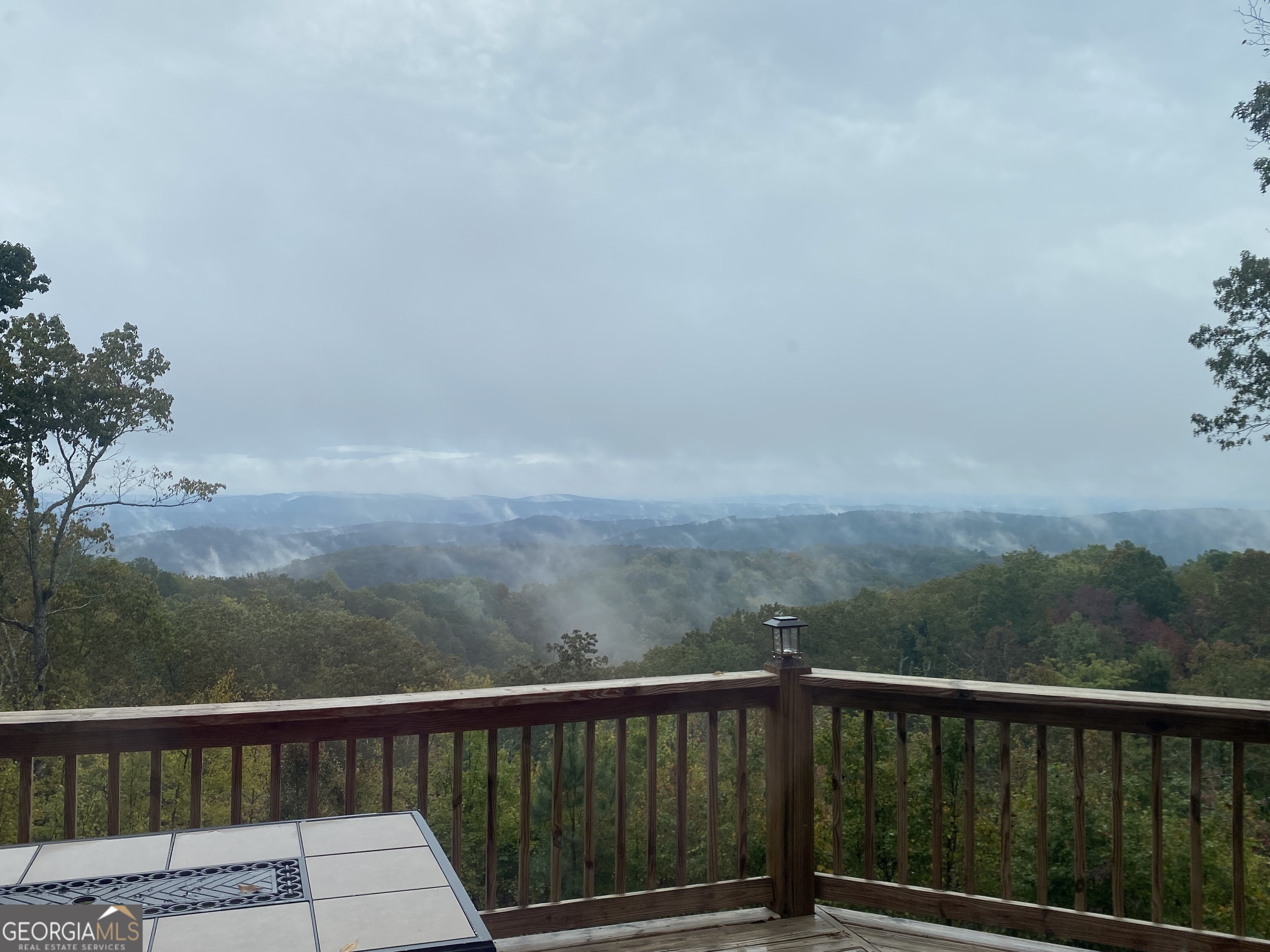 1322 Hunter Drive Ranger, GA 30734 - Photo 29 of 38 a view of a balcony with wooden floor
