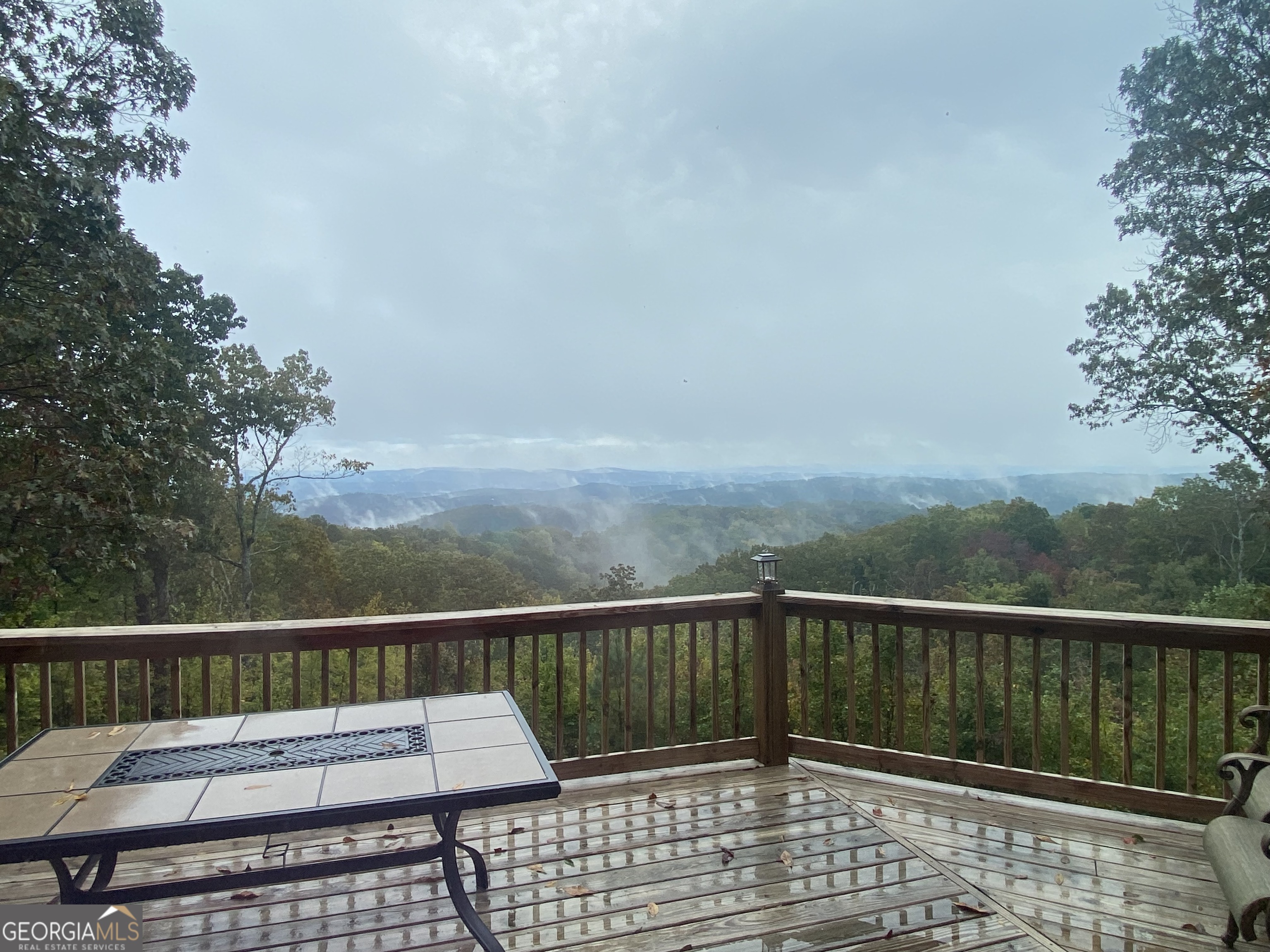 1322 Hunter Drive Ranger, GA 30734 - Photo 31 of 38 a view of a wooden deck with a patio