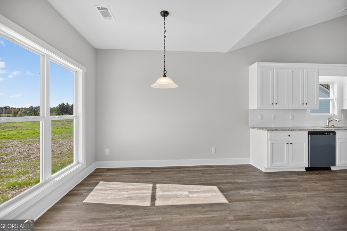 2577 Bethany Bowersville Road, Unit 7 Canon, GA 30520 - Photo 11 of 45 a view of a room with wooden floor and a window