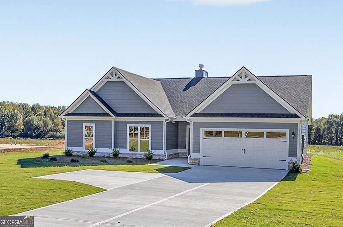 2577 Bethany Bowersville Road, Unit 7 Canon, GA 30520 - Photo 2 of 45 a front view of a house with swimming pool