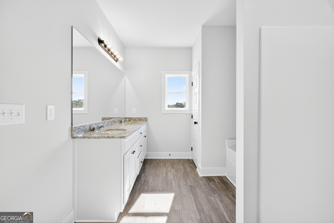 2577 Bethany Bowersville Road, Unit 7 Canon, GA 30520 - Photo 35 of 45 a view of a kitchen from a hallway
