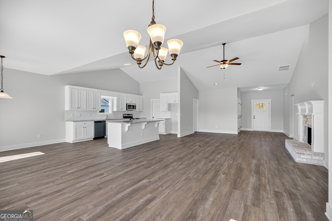 2577 Bethany Bowersville Road, Unit 7 Canon, GA 30520 - Photo 9 of 45 a view of a kitchen with a sink and chandelier