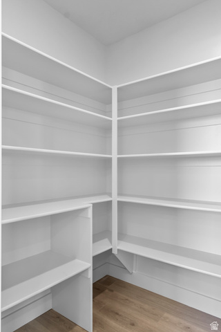 248 West 2920th Street South Logan, UT 84321 - Photo 19 of 47 Integrated white shelving, corner configuration, wood-finish flooring