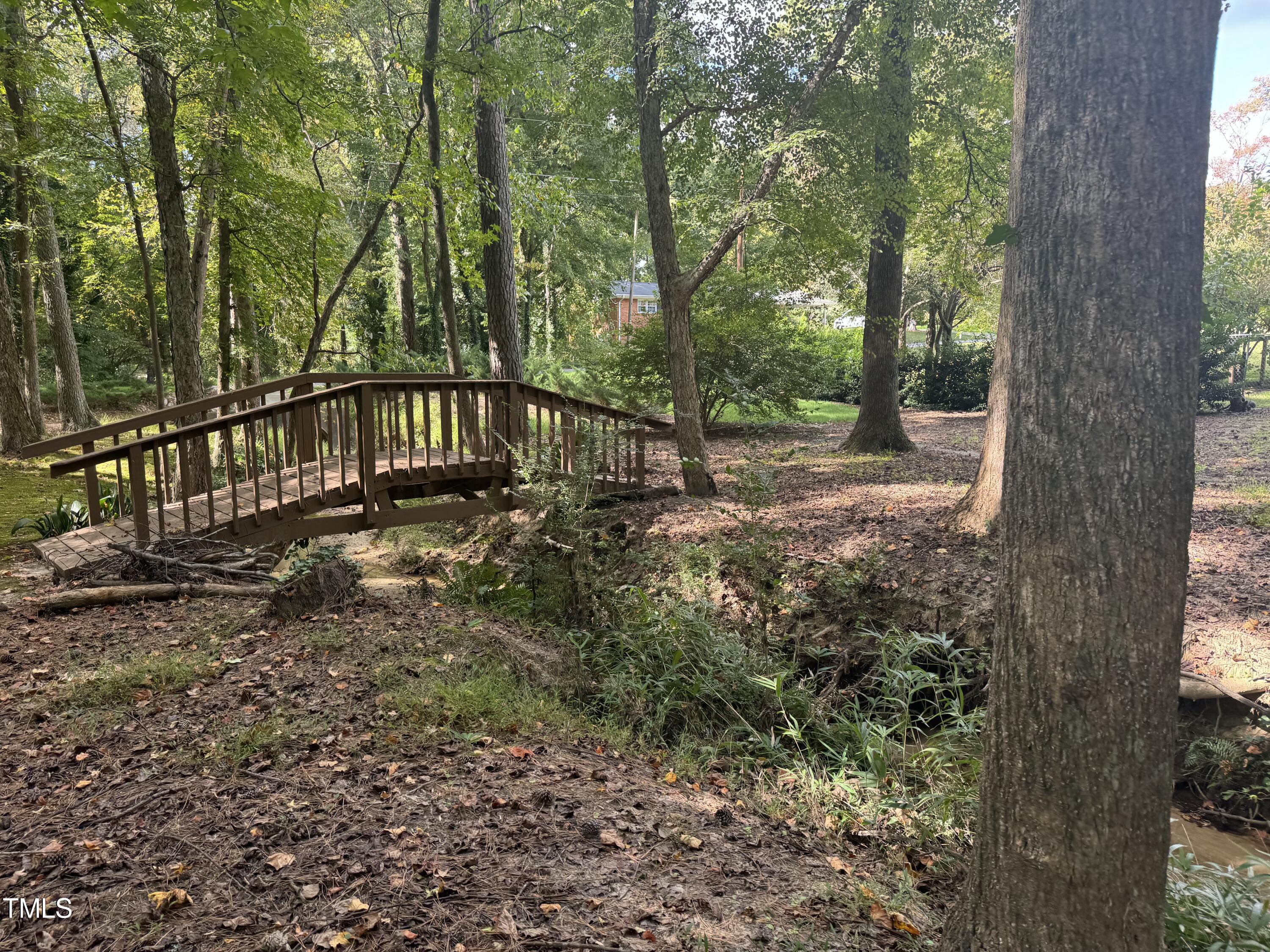 3410 Oates Drive Raleigh, NC 27604 - Photo 2 of 5 a view of a yard with large trees