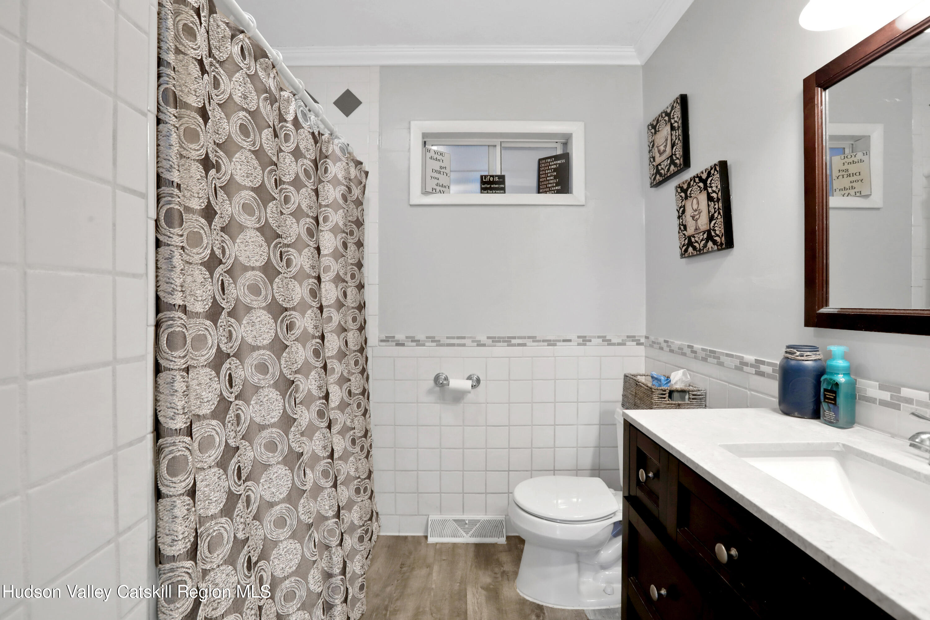 187 Russell Road Hurley, NY 12443 - Photo 15 of 33 a bathroom with a granite countertop toilet and a sink