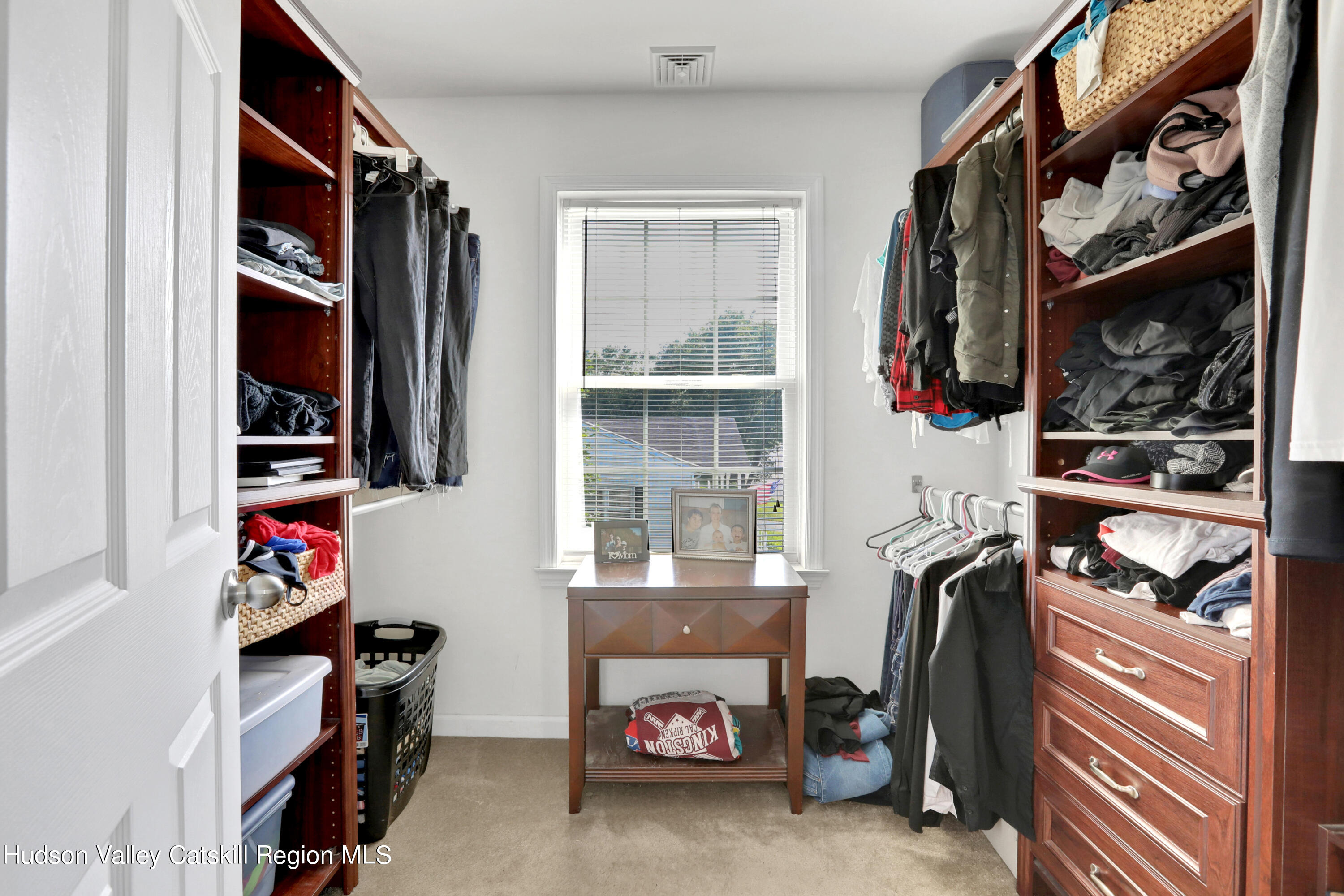 187 Russell Road Hurley, NY 12443 - Photo 19 of 33 a view of walk in closet with clothes and shoes