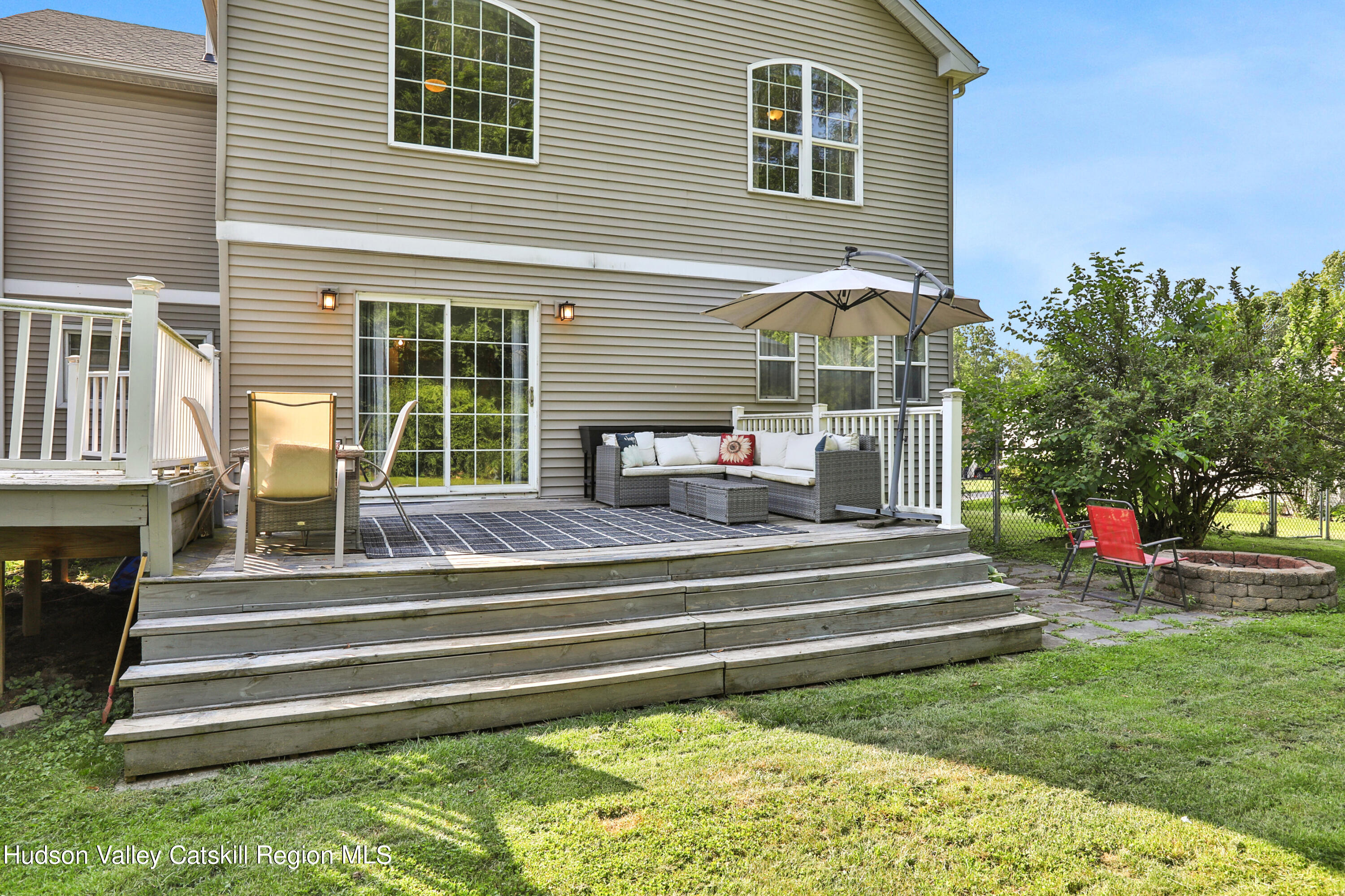 187 Russell Road Hurley, NY 12443 - Photo 27 of 33 a front view of a house with a garden and plants