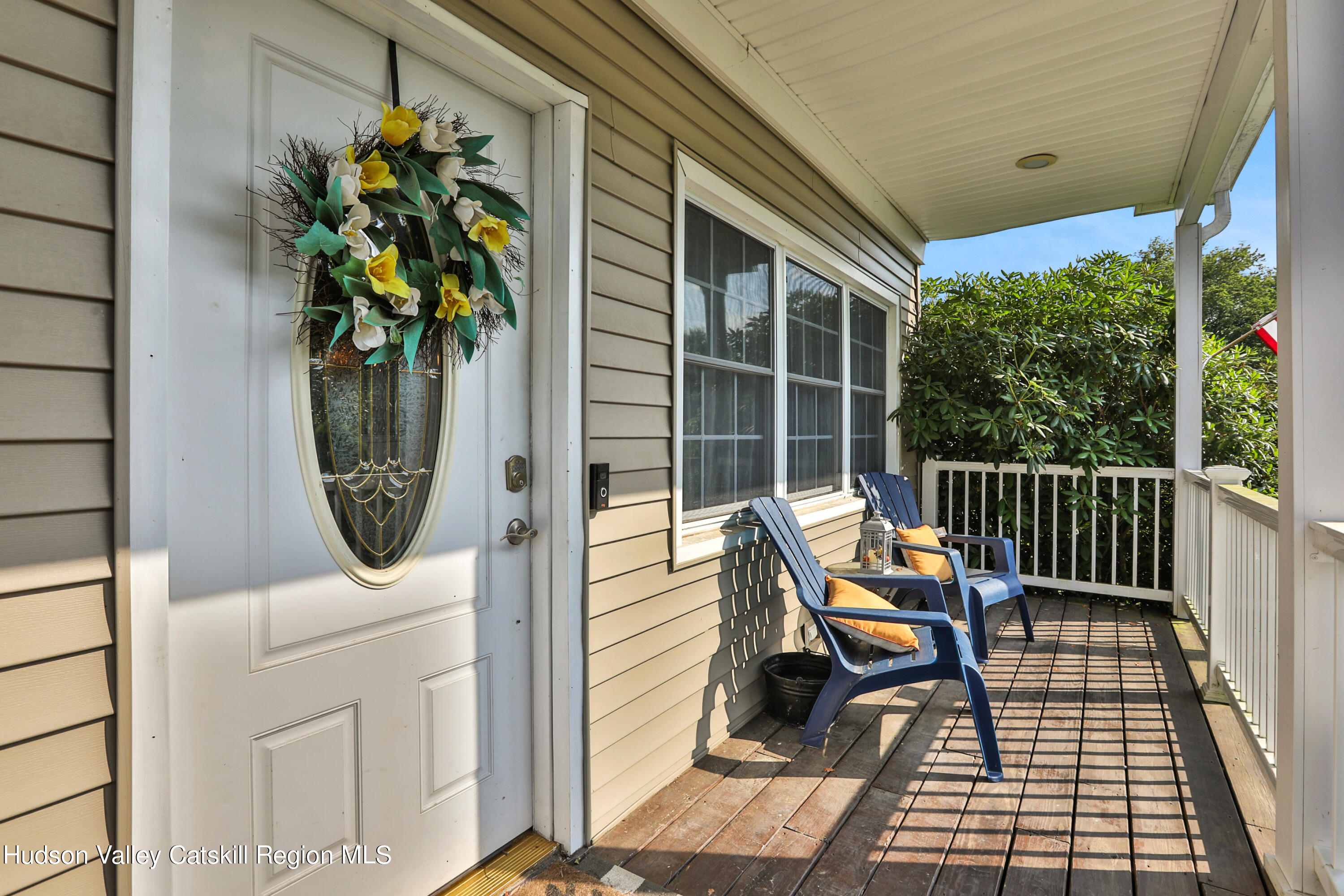 187 Russell Road Hurley, NY 12443 - Photo 4 of 33 a bench sitting in front of a building