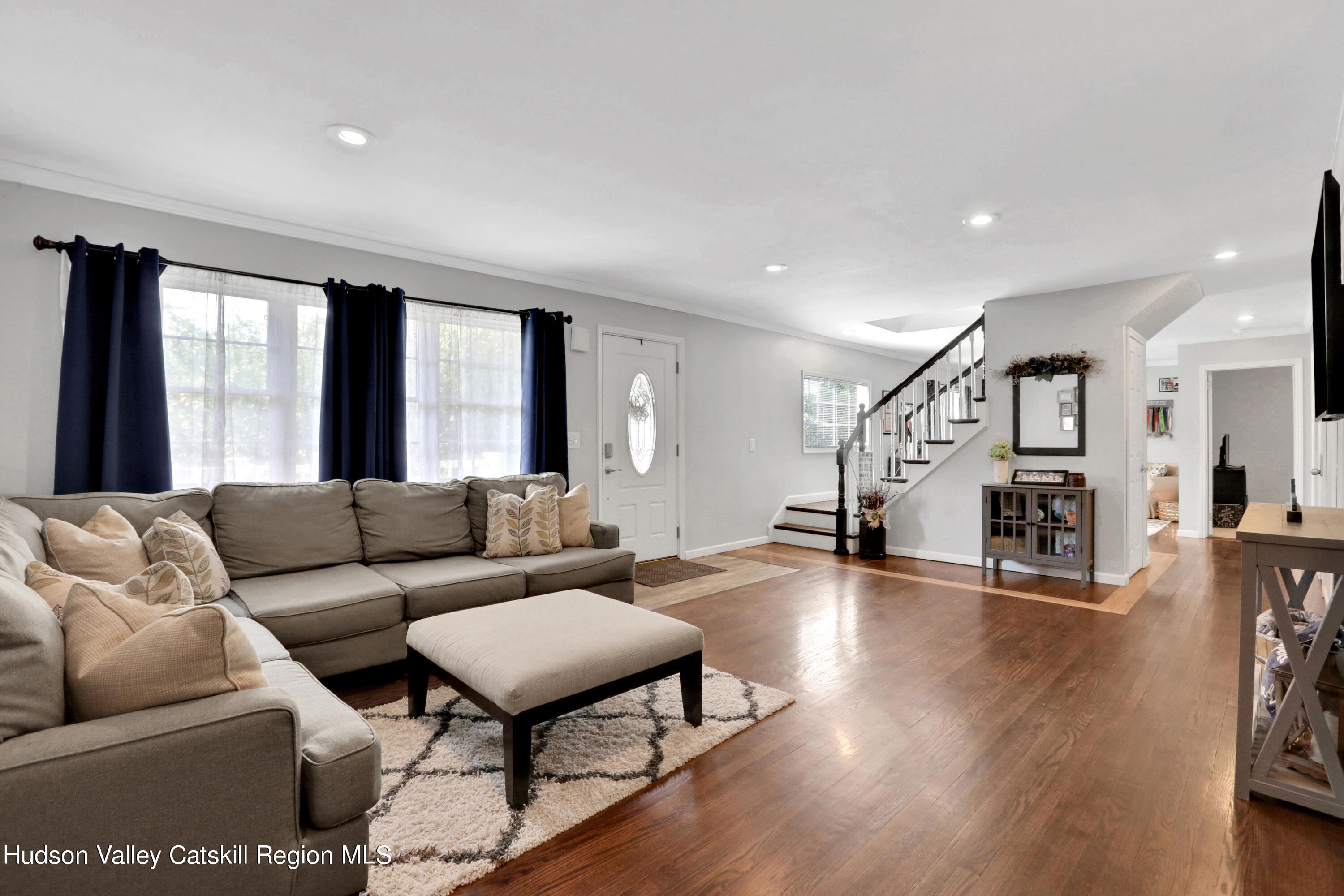 187 Russell Road Hurley, NY 12443 - Photo 5 of 33 a living room with furniture and wooden floor