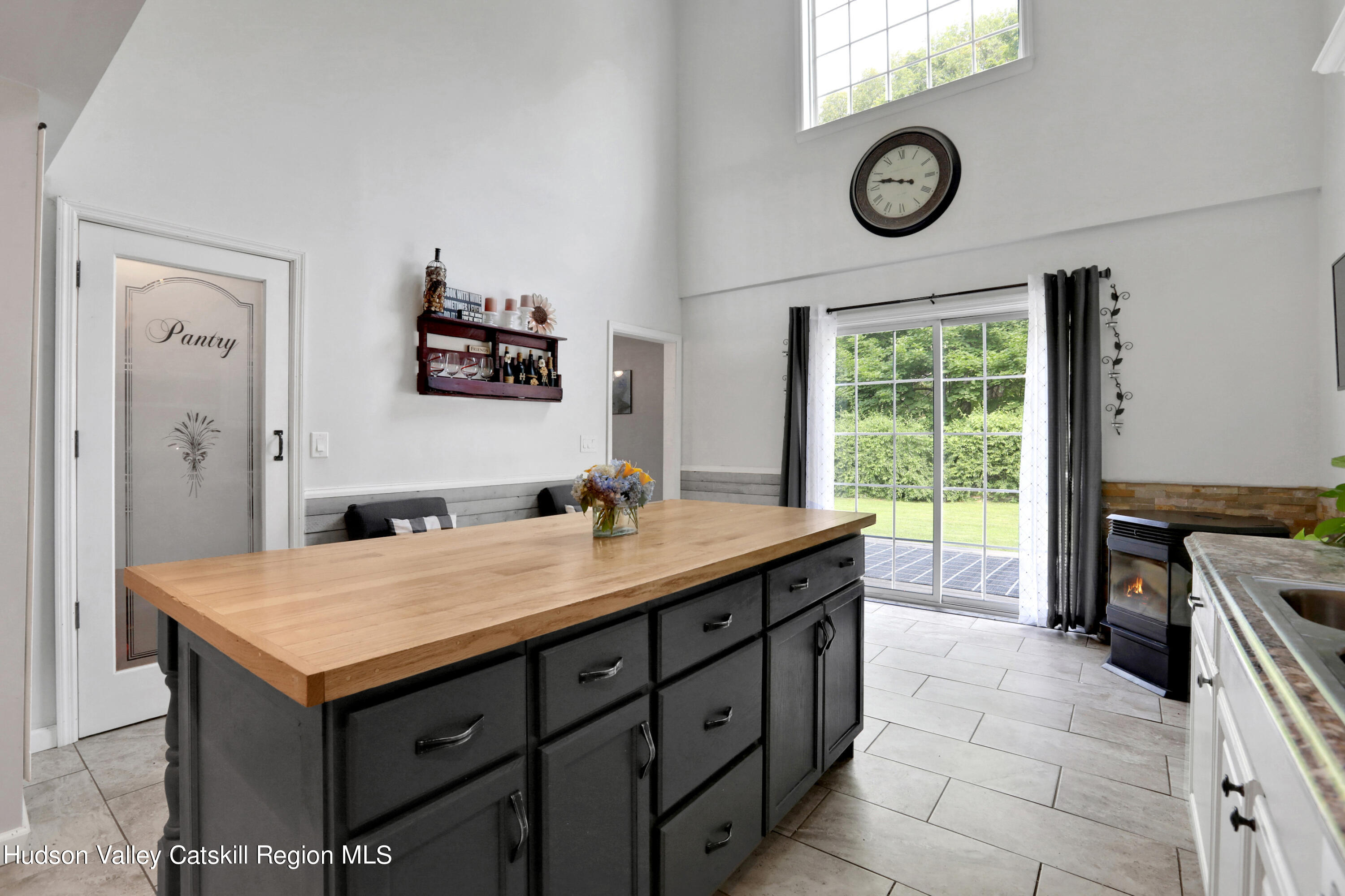 187 Russell Road Hurley, NY 12443 - Photo 10 of 33 a kitchen with a stove and a table