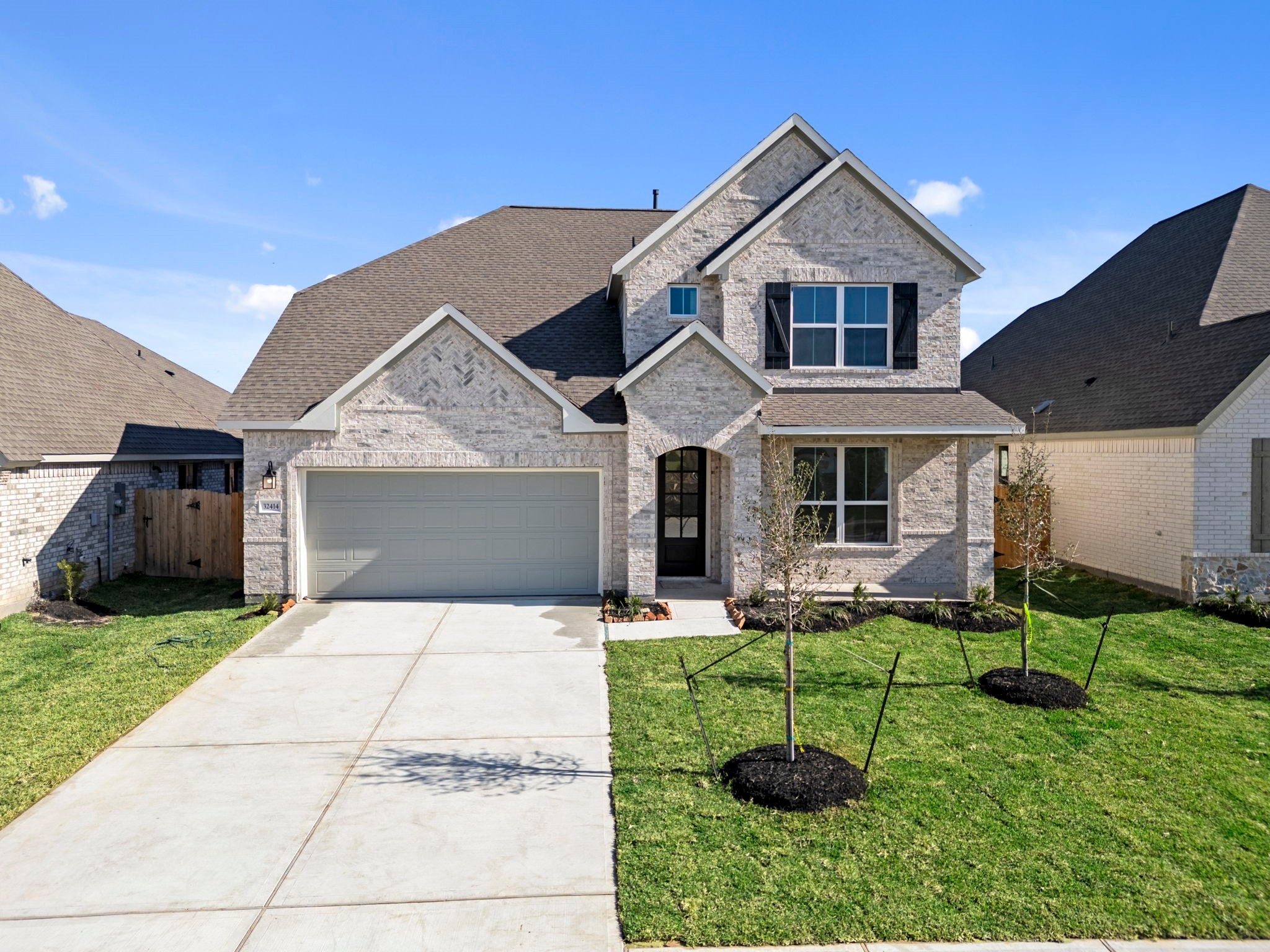 Welcome home to 32414 Poplar Grove Lane located in the community of The Meadows at Imperial Oaks zoned to Conroe ISD.