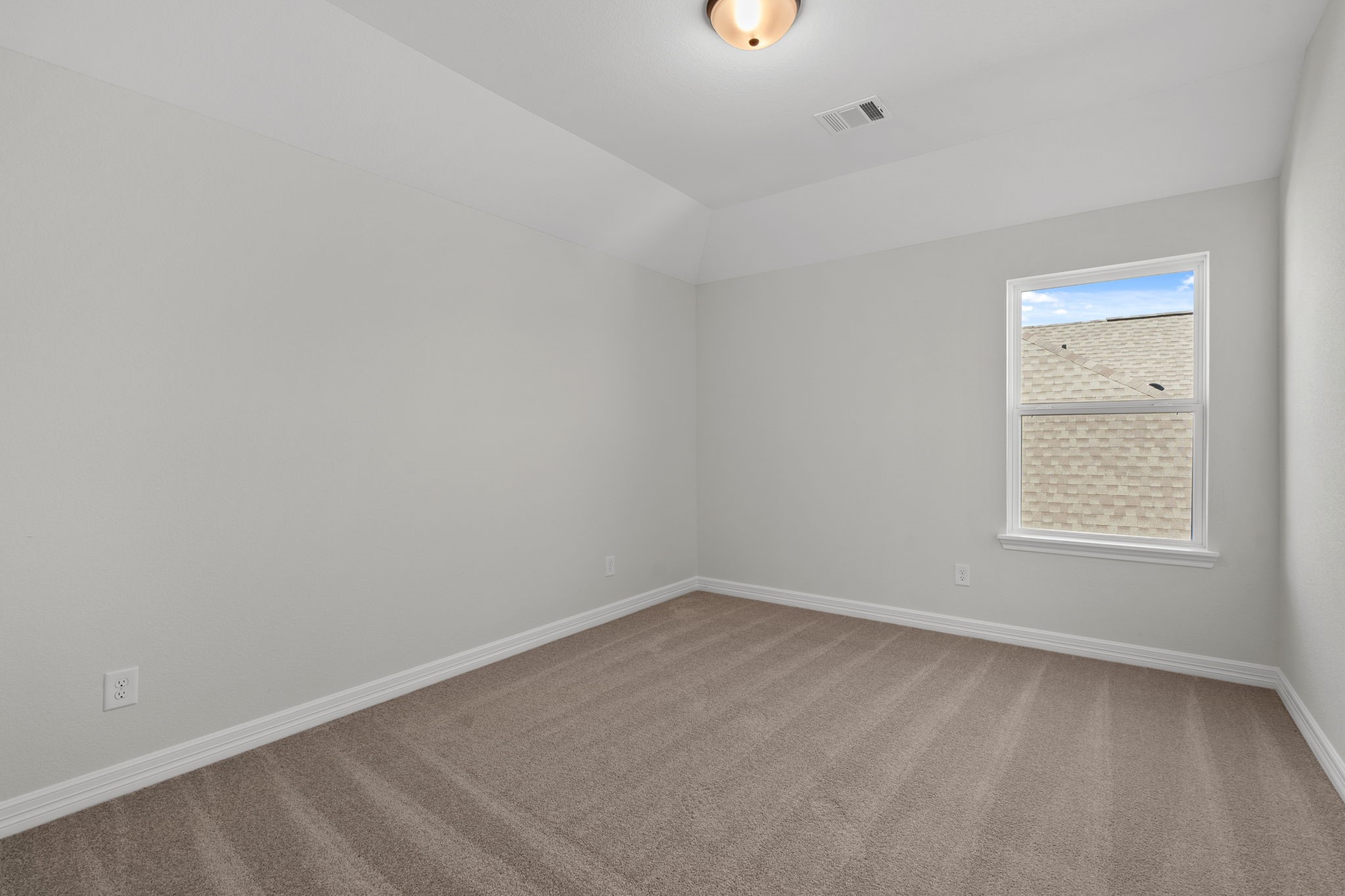 32414 Poplar Grove Lane Conroe, TX 77385 - Photo 20 of 30 Your secondary bedroom features plush carpet, fresh paint, closet, and a large window that lets in plenty of natural lighting.