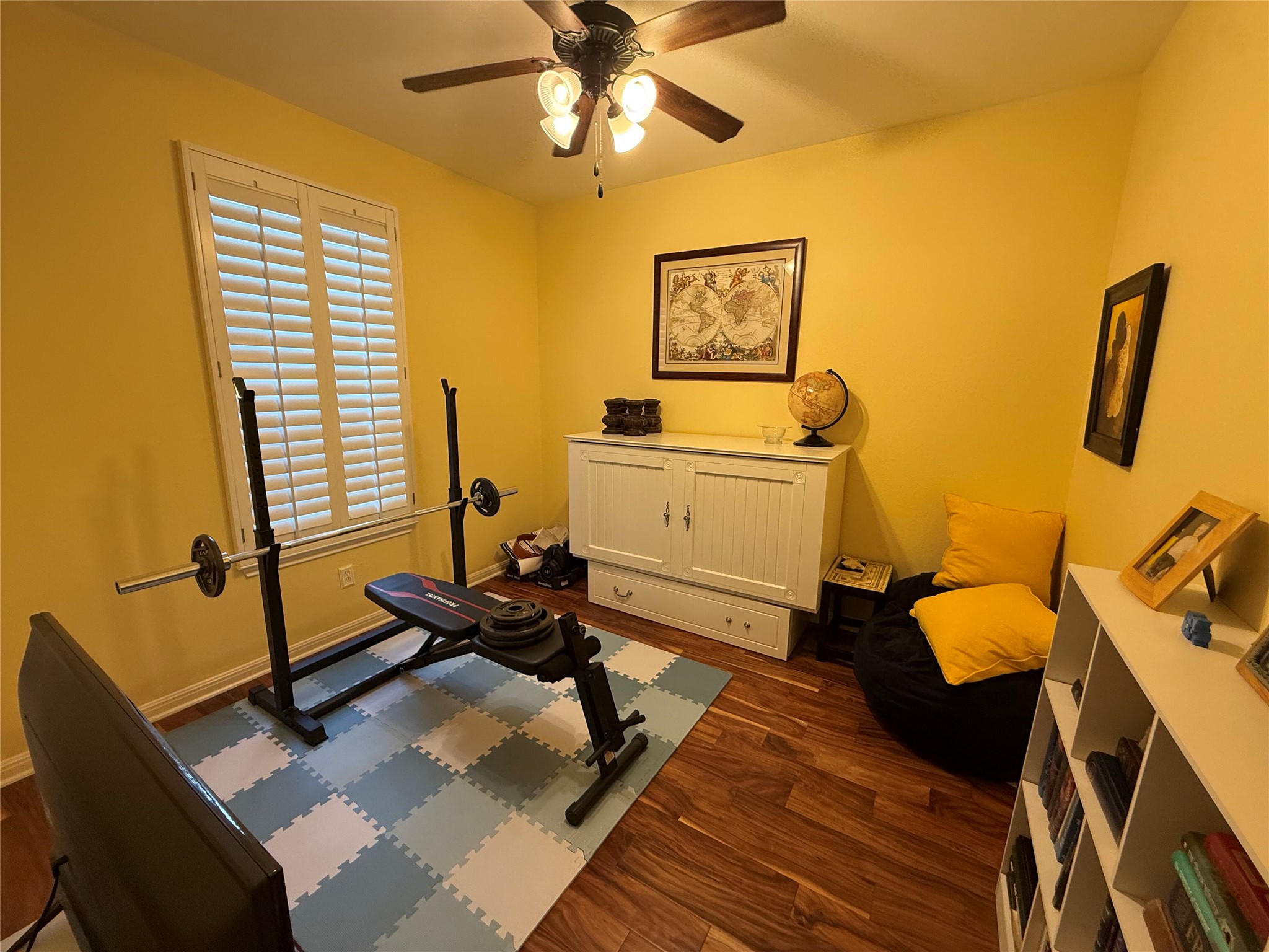 11000 Anderson Mill Road, Unit 93 Austin, TX 78750 - Photo 14 of 27 Hardwood floors and bright walls create an inviting space for work or relaxation.