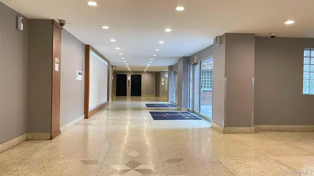 a view of hallway with a large window