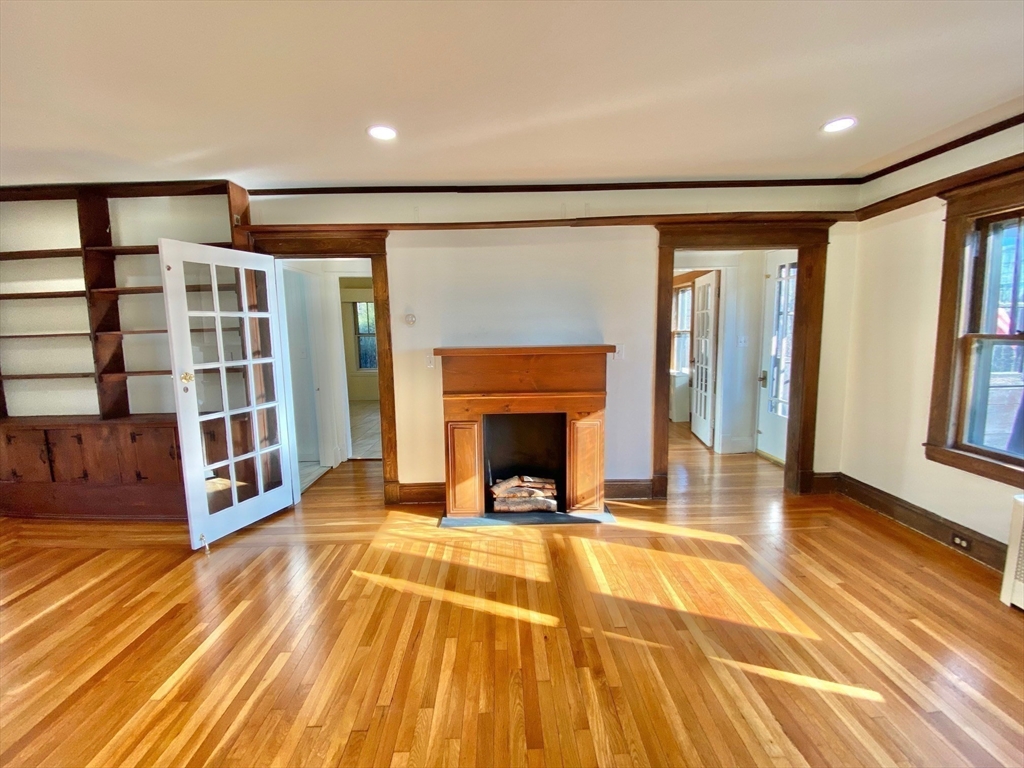 42 Amherst Road South Hadley, MA 01075 - Photo 12 of 28 a view of a livingroom with an empty space and a fireplace