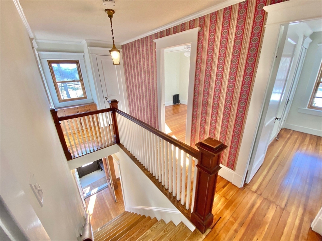 42 Amherst Road South Hadley, MA 01075 - Photo 14 of 28 a view of an entryway with hardwood floor and stairs