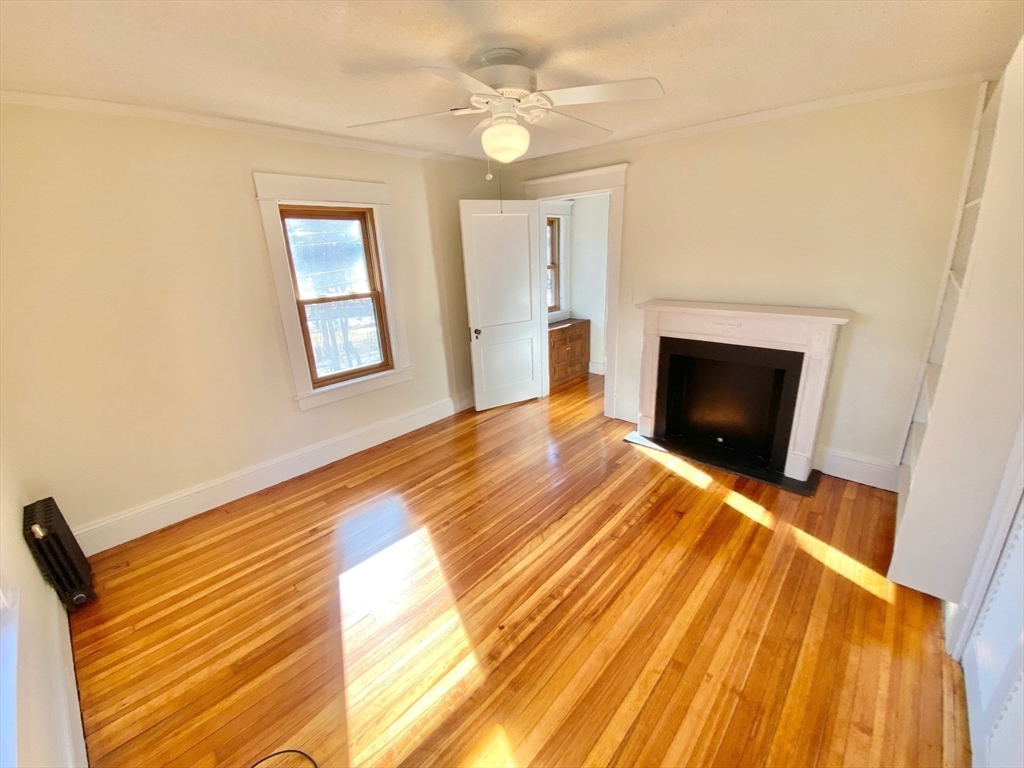 42 Amherst Road South Hadley, MA 01075 - Photo 22 of 28 a bedroom with a bed and a fireplace
