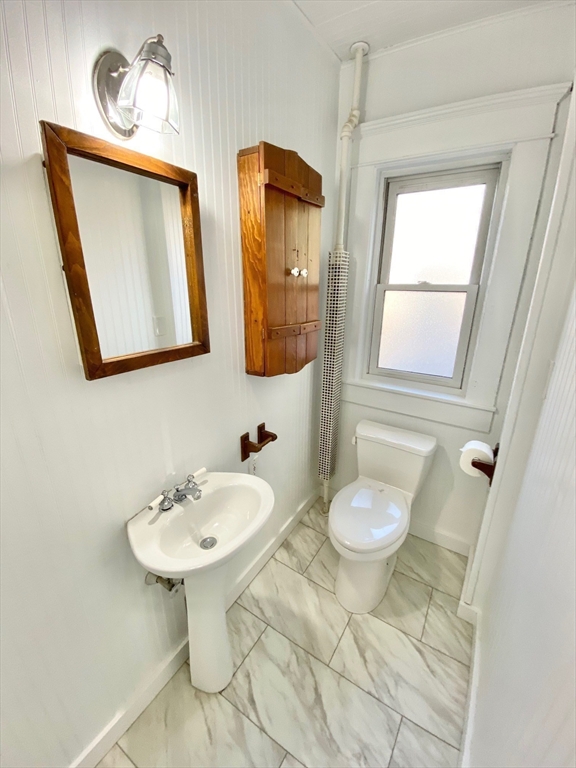 42 Amherst Road South Hadley, MA 01075 - Photo 26 of 28 a bathroom with a toilet sink and mirror