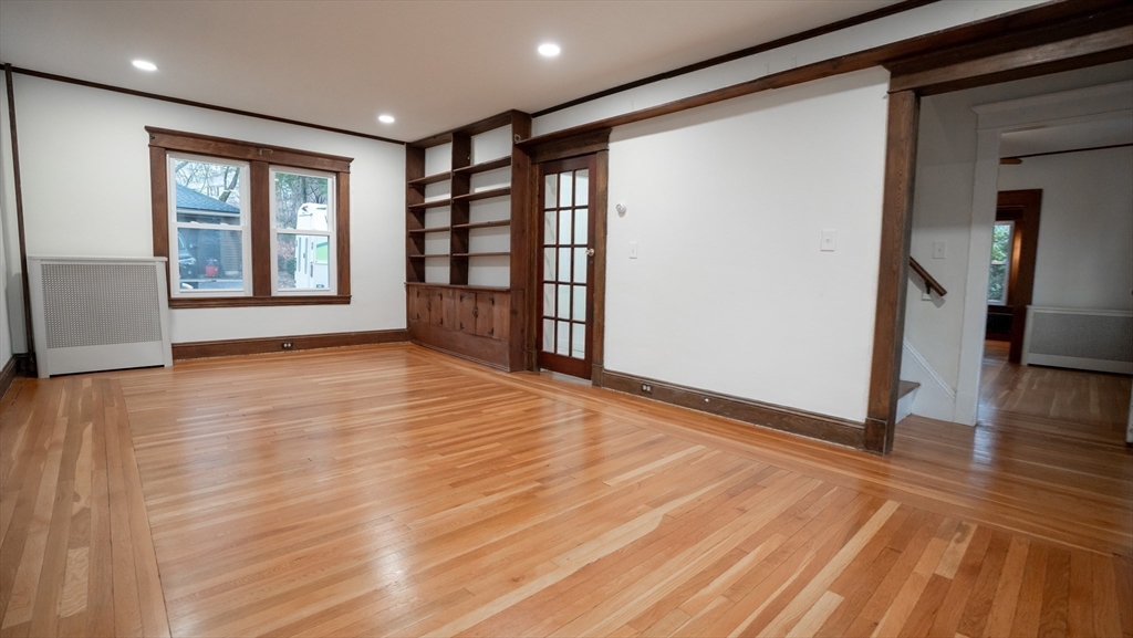 42 Amherst Road South Hadley, MA 01075 - Photo 7 of 28 a view of empty room with wooden floor and fan