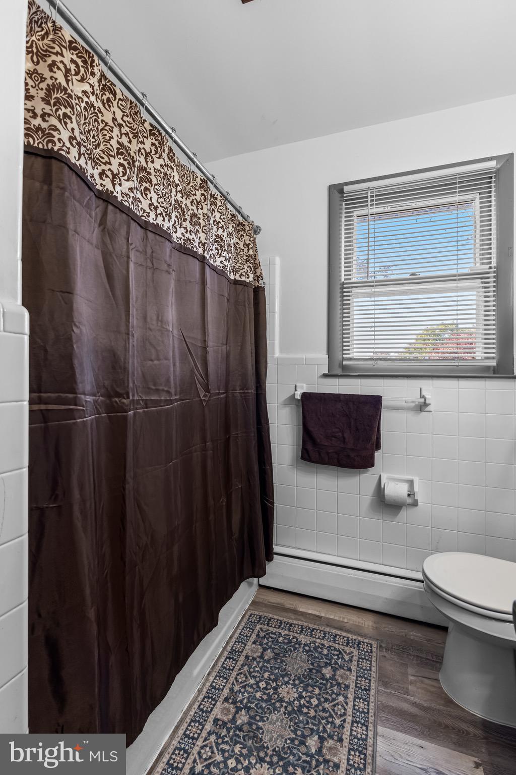 147 New Union Street Salem, NJ 08079 - Photo 11 of 28 a bathroom with a toilet and a shower
