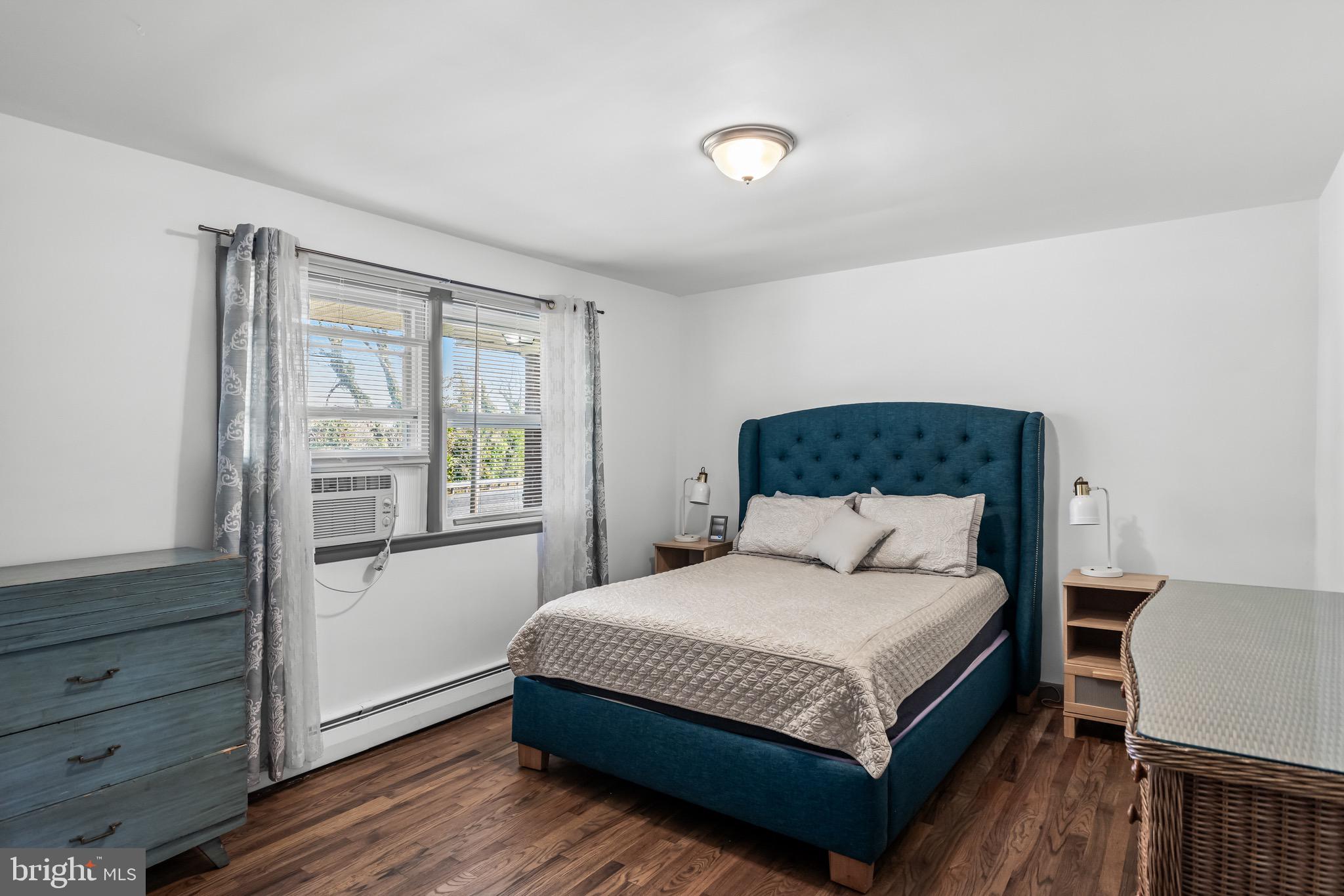 147 New Union Street Salem, NJ 08079 - Photo 12 of 28 a bedroom with a large bed and a window