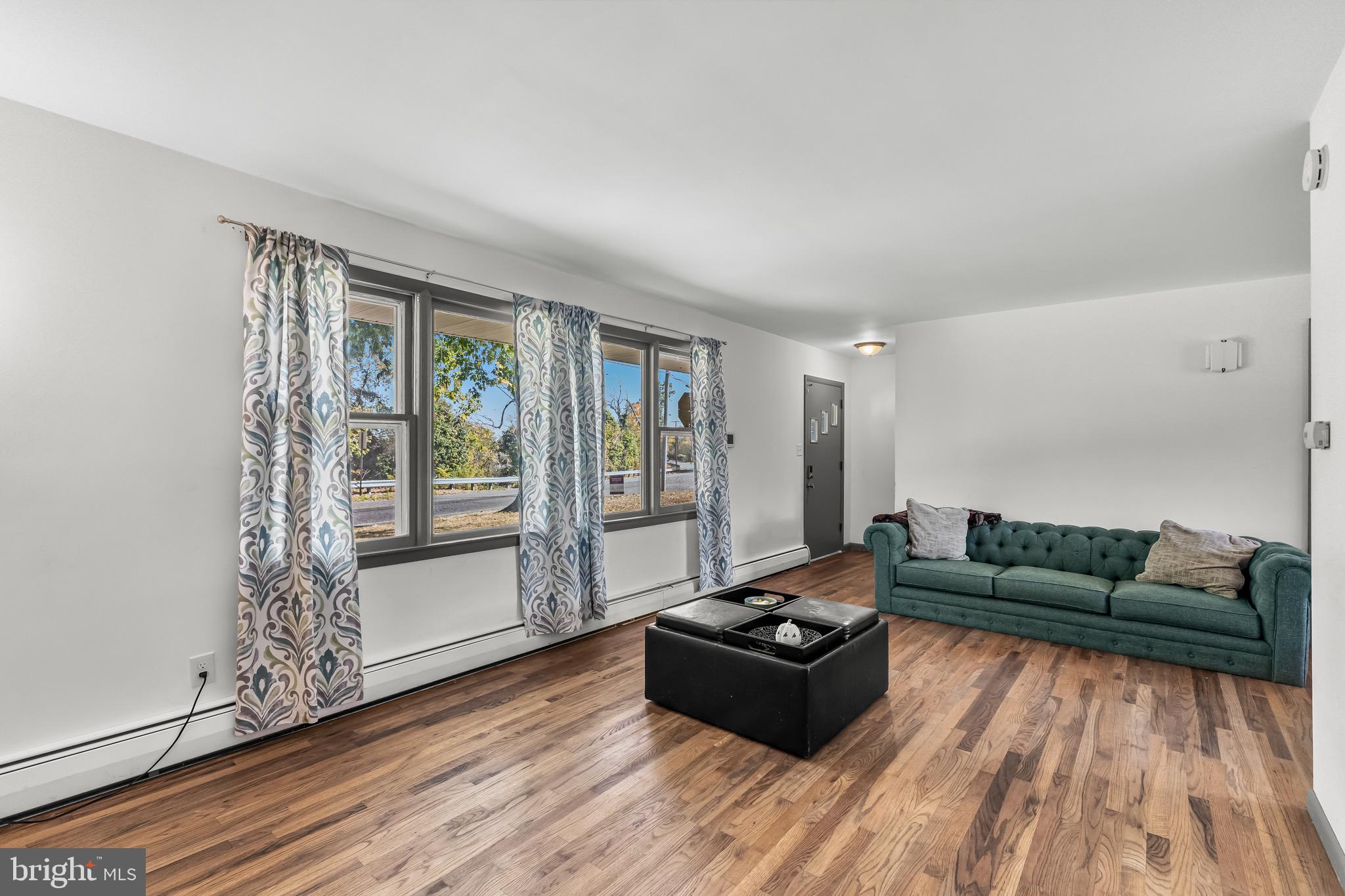 147 New Union Street Salem, NJ 08079 - Photo 9 of 28 a living room with furniture and wooden floor