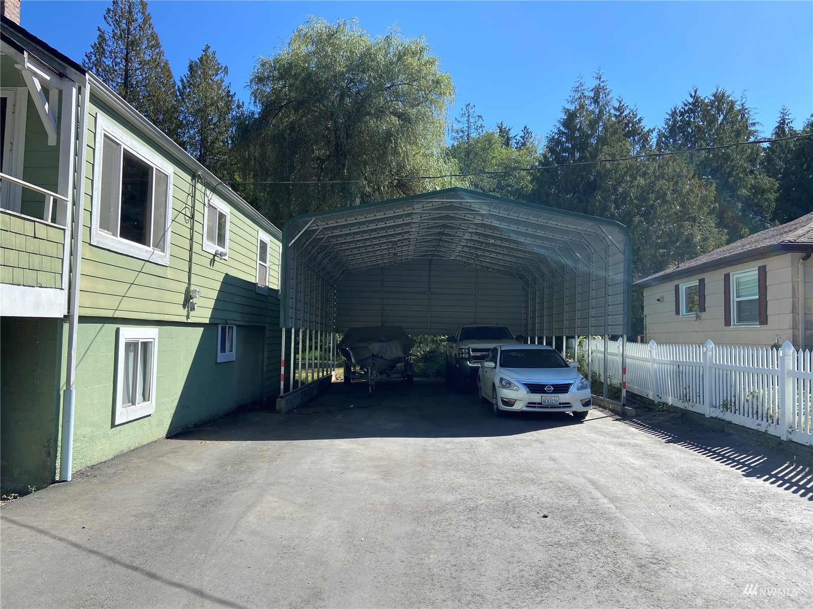 4191 Kitsap Lake Road Northwest Bremerton, WA 98312 - Photo 11 of 17 a view of a car in front of a house