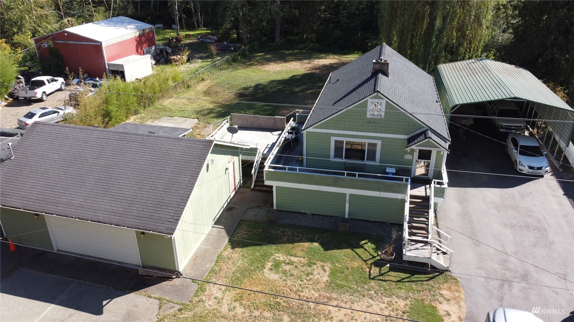 4191 Kitsap Lake Road Northwest Bremerton, WA 98312 - Photo 13 of 17 a aerial view of a house with swimming pool and next to a yard