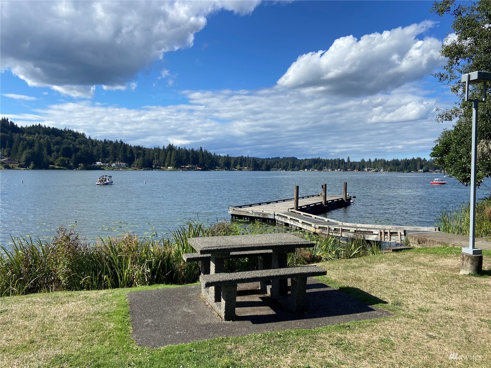 4191 Kitsap Lake Road Northwest Bremerton, WA 98312 - Photo 17 of 17 a view of a terrace with a lake view