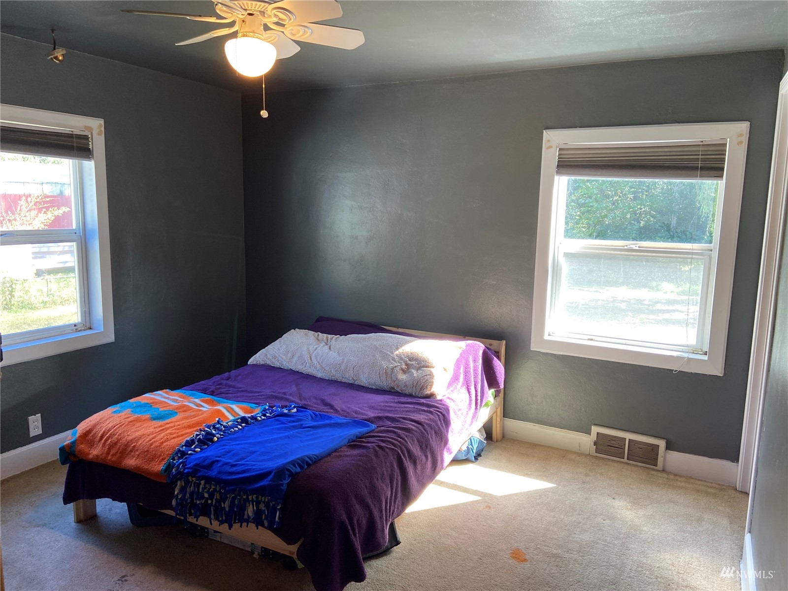 4191 Kitsap Lake Road Northwest Bremerton, WA 98312 - Photo 8 of 17 a bedroom with a bed and a window