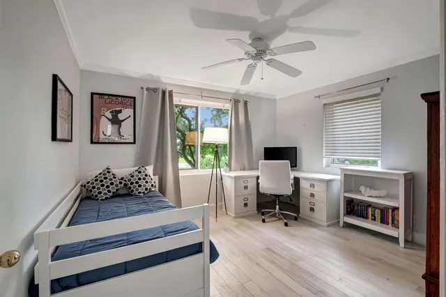 a view of a house with backyard porch and sitting area