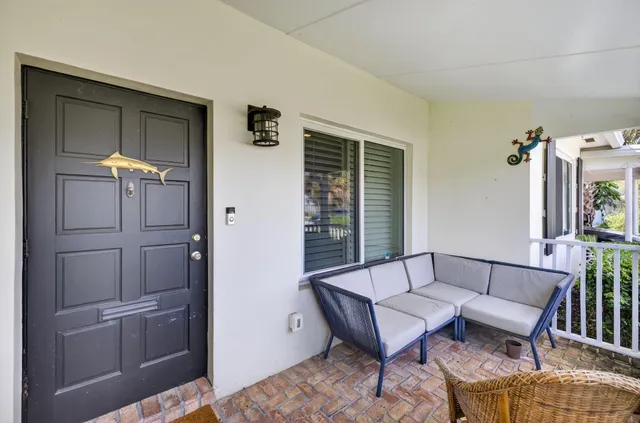 a kitchen with stainless steel appliances granite countertop a stove and cabinets