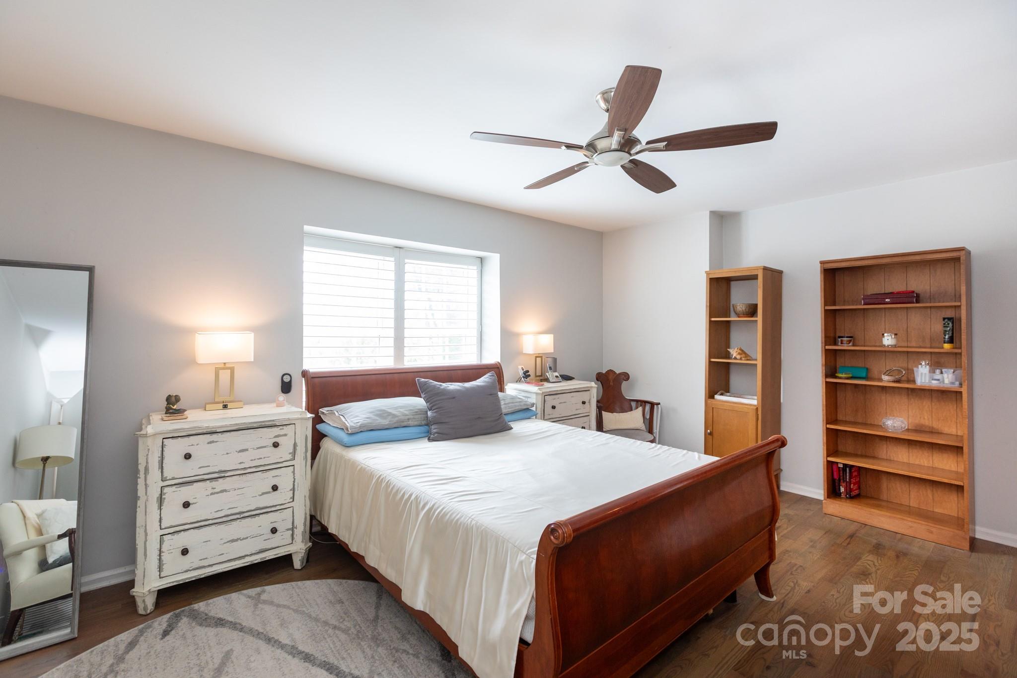 2229 Rexford Road, Unit E Charlotte, NC 28211 - Photo 20 of 28 a bedroom with a bed and a window
