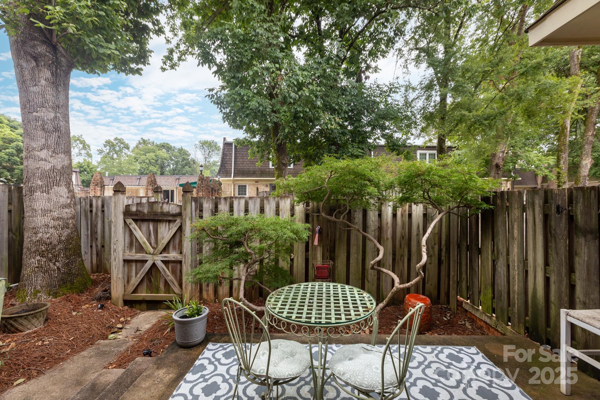 2229 Rexford Road, Unit E Charlotte, NC 28211 - Photo 25 of 28 a view of outdoor space and patio