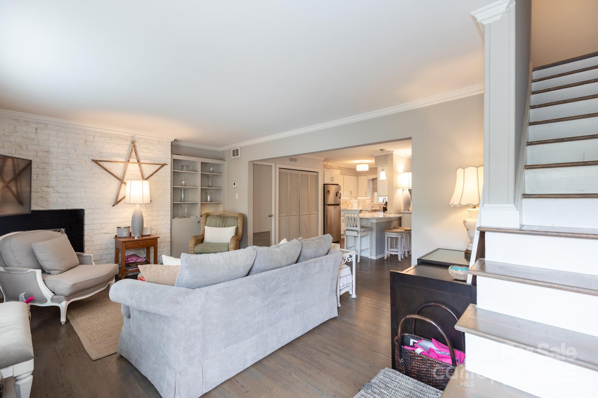 2229 Rexford Road, Unit E Charlotte, NC 28211 - Photo 4 of 28 a living room with furniture and a large window